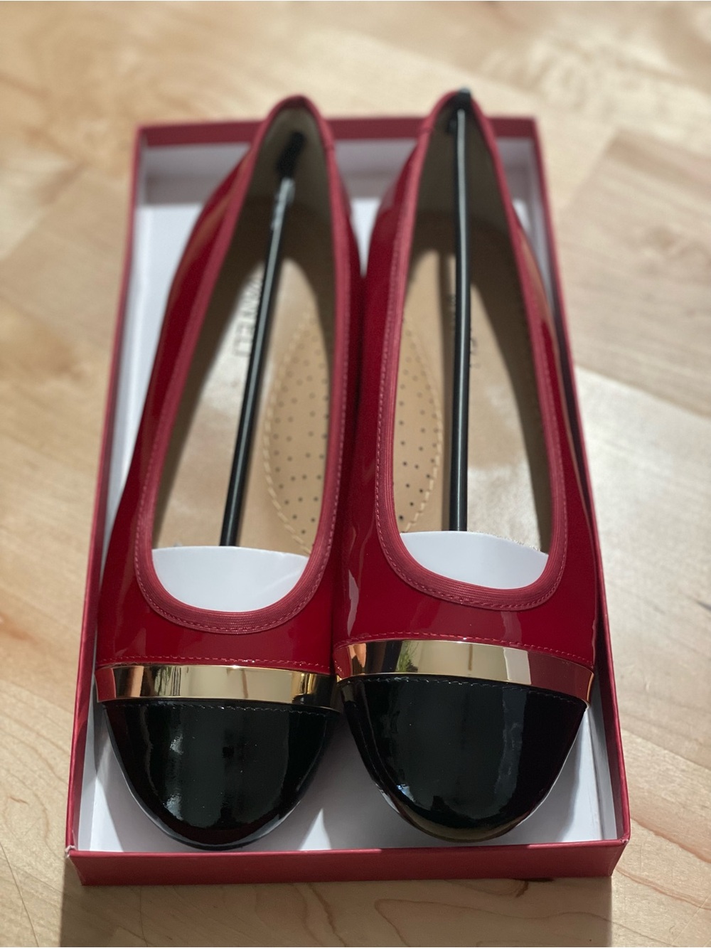 New in box Van Eli Sebelie ballet flats in a beautiful dark red patent leather.